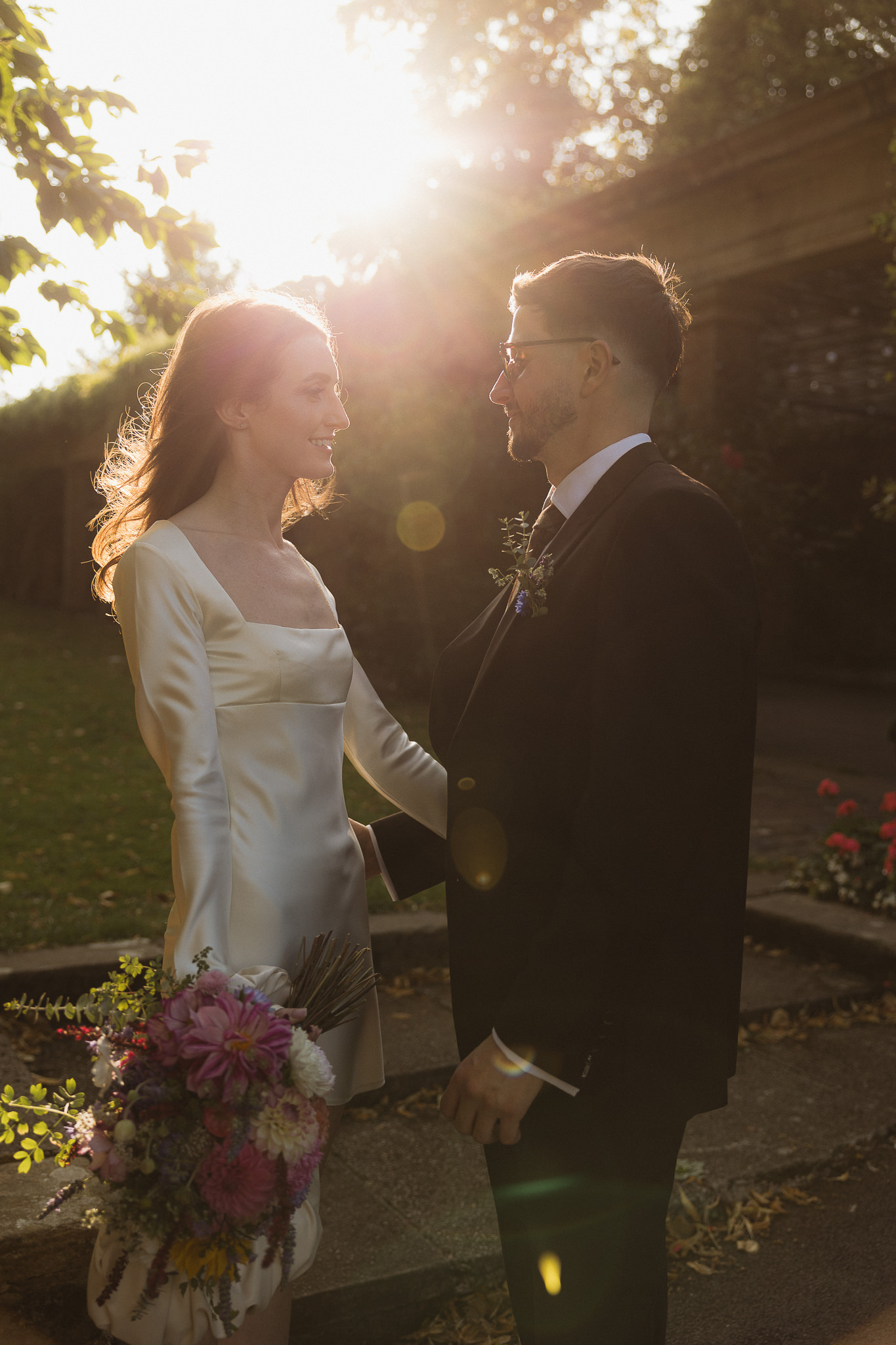 Harrogate wedding, bride and groom in valley gardens Harrogate sun is behind them 